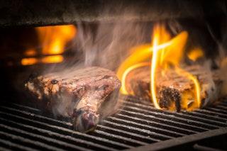 Though the Tower Bridge development that houses The Coal Shed is almost corporatelooking the chic interiors and smiling...